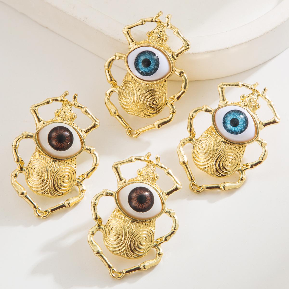 

Exaggerated Insect Earrings Fashion Creative Oil Drop Devil s Eye Studs Personality High-end Earrings коричневий