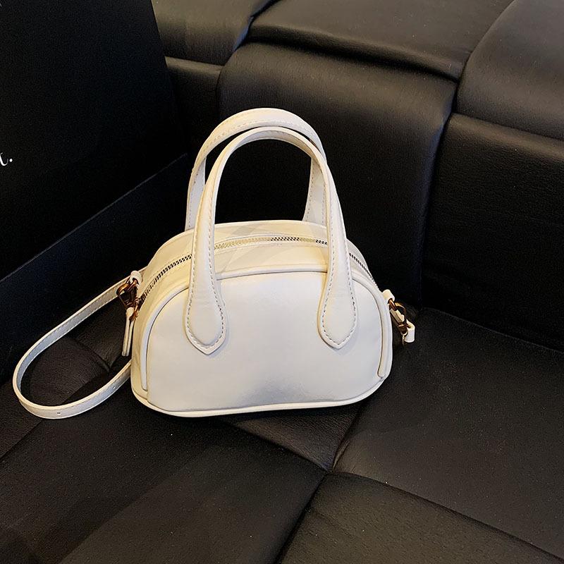 Mode handburen kuddeväska dam 2025 ny avslappnad mjuk läder axel skalväska trendig budväska