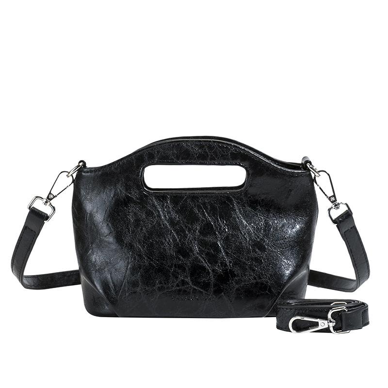 Wholesale simple style texture portable bucket bag fashion casual women commuting niche design messenger bag