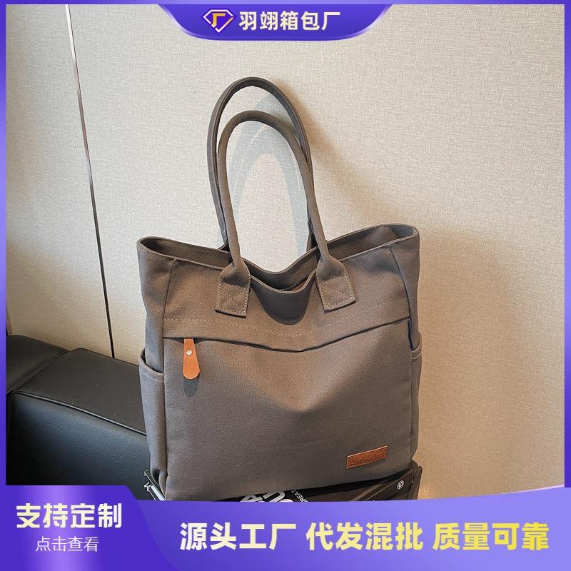 Casual large-capacity canvas bag women's new fashion commuter versatile shoulder bag college student tote bag