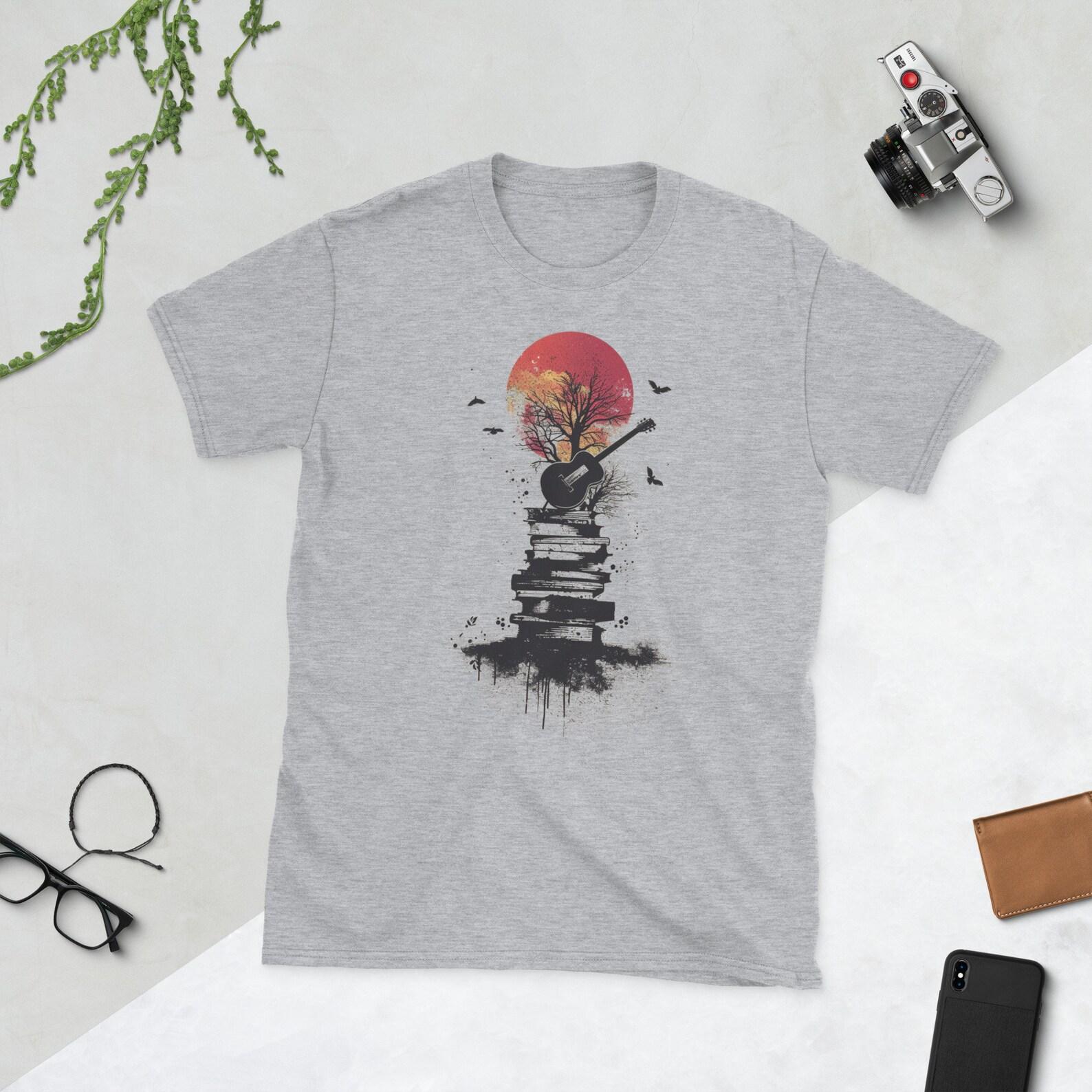 Guitar and Books Sunset Graphic T-Shirt - Artistic Literary Tee - Unisex Casual Wear - Perfect Gift for Music and Book Lovers XL