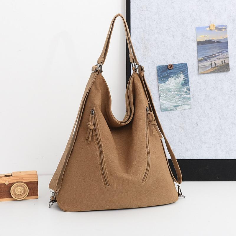 

Large capacity canvas backpack, messenger bag, schoolbag, solid color handbag, casual multi-purpose travel backpack, shoulder bag. коричневый