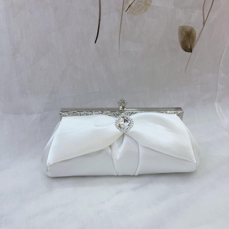 

New hot-selling white wedding ladies portable dinner bag bow rhinestone cheongsam premium banquet clutch bag білий