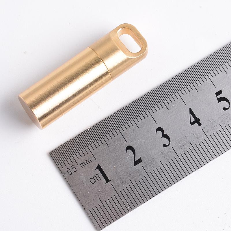 

Brass Waterproof EDC Medicine Bottle - Portable, Light-proof, Moisture-proof Keychain Pendant for Outdoor Use