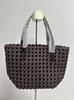 New Large Capacity Hand-Woven Pinwheel Knot Tote Bag with Niche Cutout Design for Mother and Child.