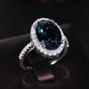 Cao Shi Wish Elegant Peacock Blue Zircon Egg-Shaped Ring for Women - Anniversary Celebration Accessory.