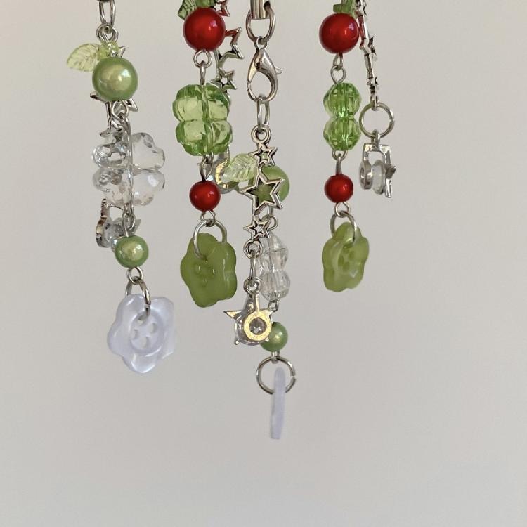 Glücksbringer Schlüsselanhänger mit grünen Vierblättrigen Kleeblatt Perlen Koreanisch Inspirierte Mode Handy-Gurt Zubehör Für Den Täglichen Gebrauch