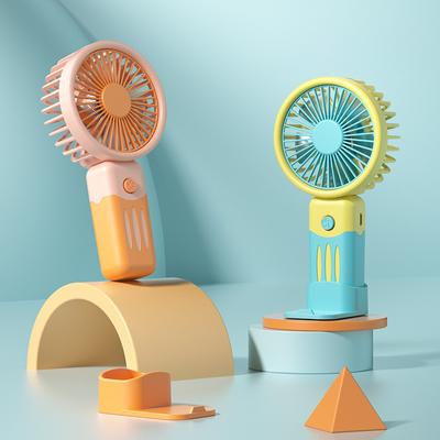 Handheld Mini Electric Fan Cartoon USB Charging Compact and Portable Handheld Desktop Small Fan Cross Border Strong Wind