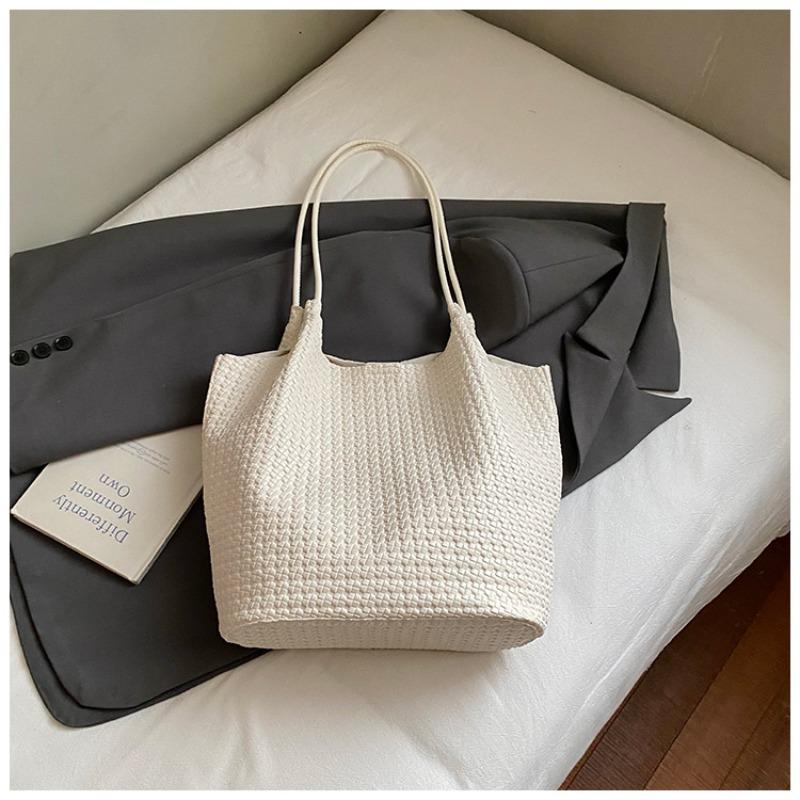 Autumn new texture braided pattern commuting simple large capacity retro solid color bucket armpit shoulder bag for women