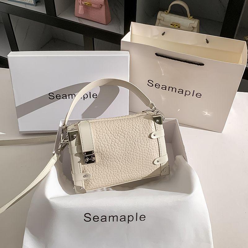 

Cowhide Casual Fashion Fancy Small Square Bag Beige