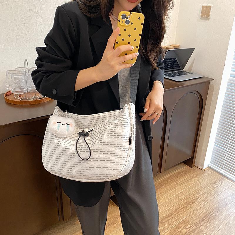 Premium plaid casual large-capacity drawstring tote bag women's 2025 new versatile texture trendy shoulder bag