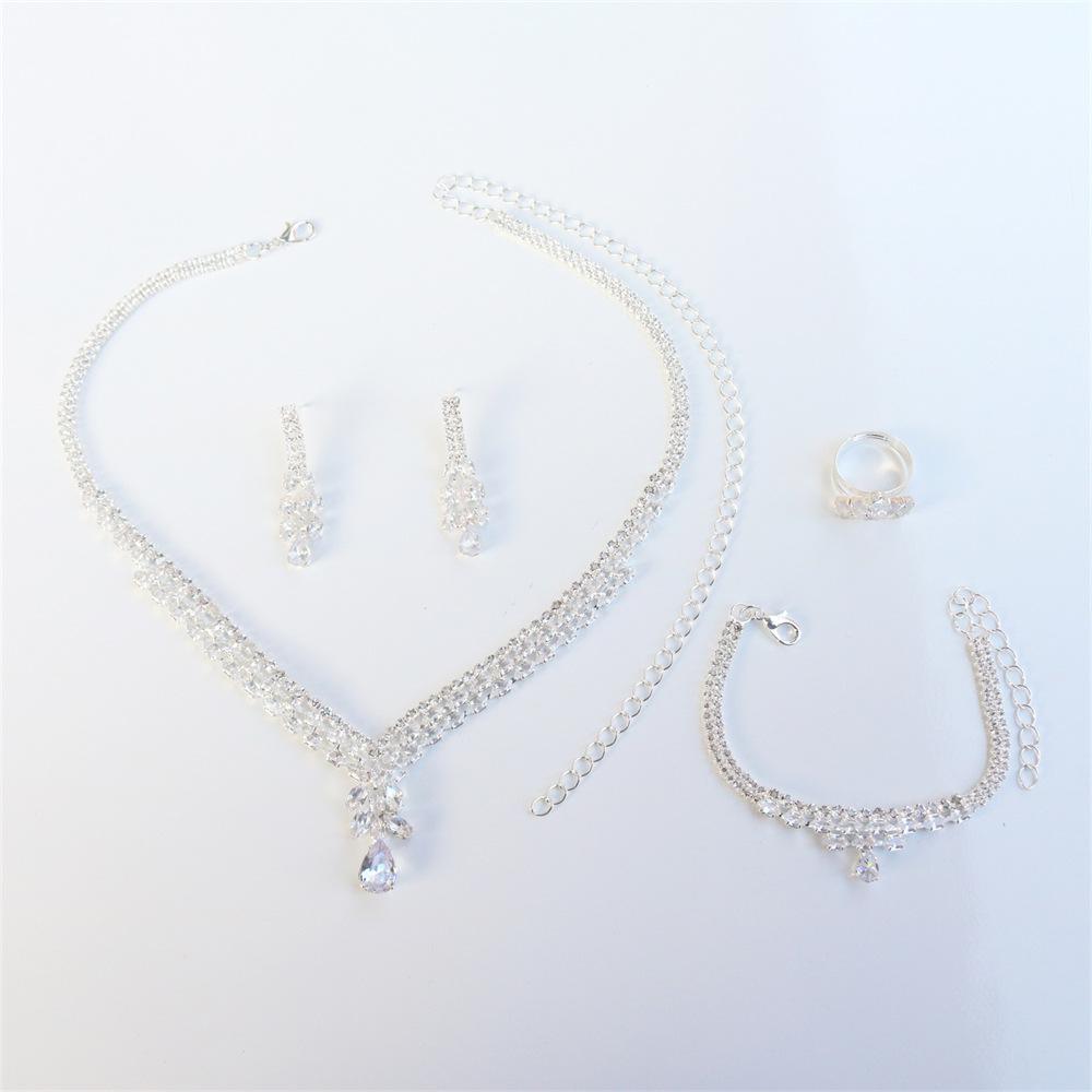 

European And American Fashion Popular Leaf Water Drop Super Flash Crystal Necklace Earrings Bracelet Four-Piece Women S Dinner Dress Accessories срібний