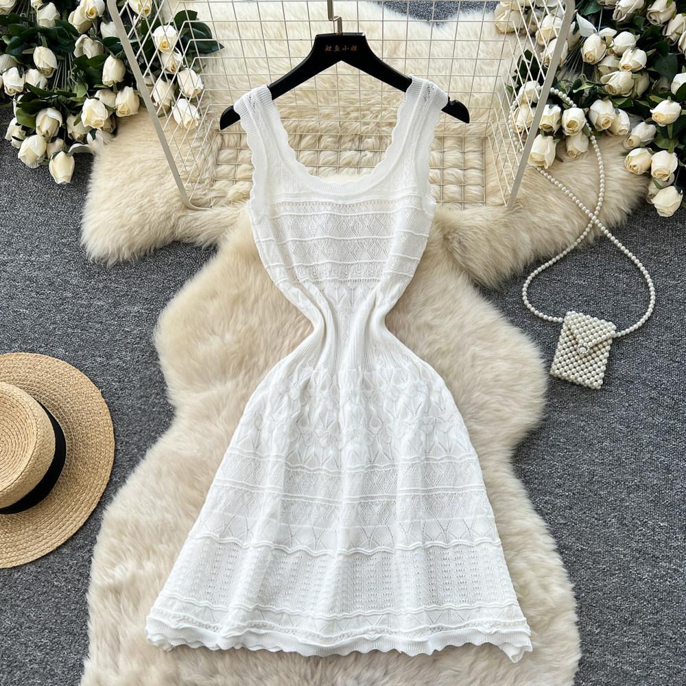 French white sleeveless knitted dress women's summer new cold hollow waist thin A-shaped skirt thousand gold style