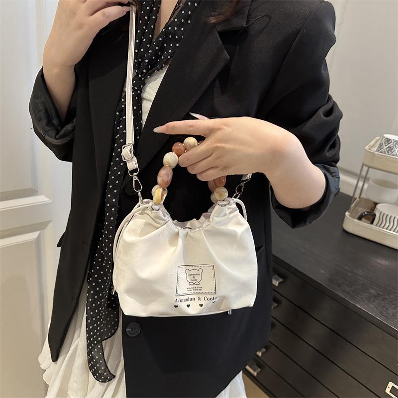 

Summer new pleated design 2025 fashion trend texture women s casual shoulder crossbody bucket bag рожевий