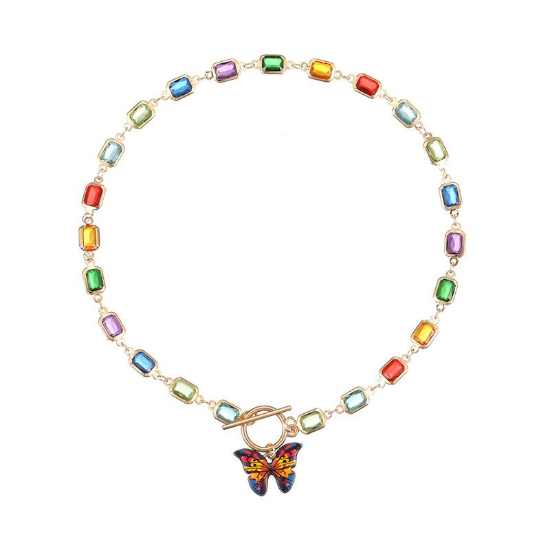 

Модное ожерелье-чокер в винтажном стиле с квадратным кристаллом и медной подвеской в виде бабочки