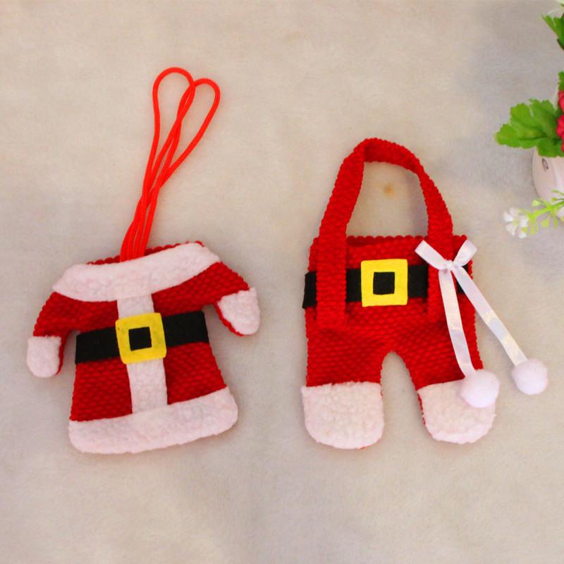 Unique Christmas Table Dcor With Whimsical Cloth Cutlery Wraps And Mini Garments For Festivities