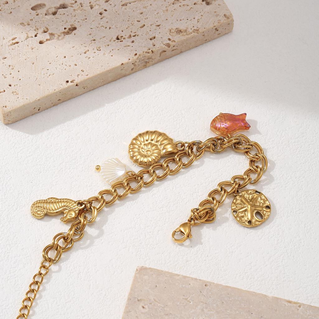Golden Tone Stainless Steel Ocean Charm Bracelet with Seahorse and Fish Pendants for Women