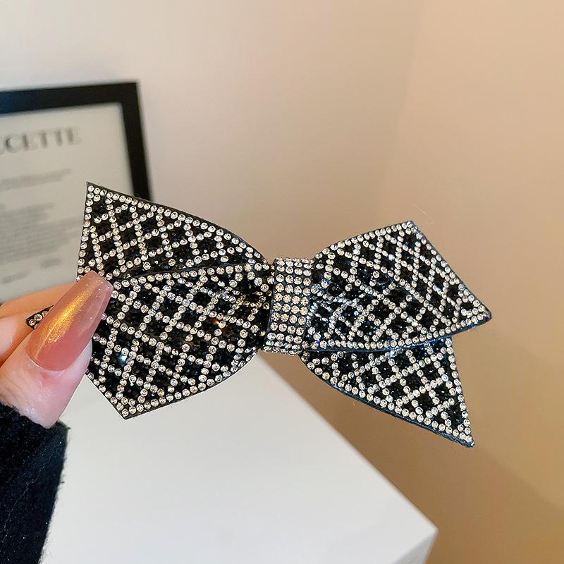 Korean version of fashion bow hairpin niche simple and versatile temperament spring clip advanced semi-drape hairpin