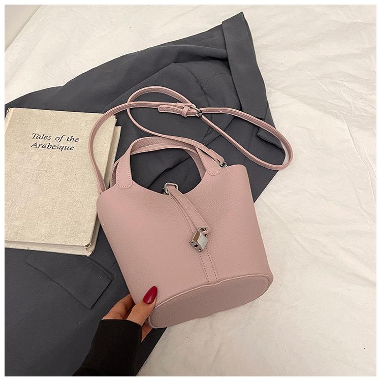 Beliebte tragbare Eimertasche Damen Frühling und Sommer 2025 Neue einfache und lässige Umhängetasche Modische Umhängetasche