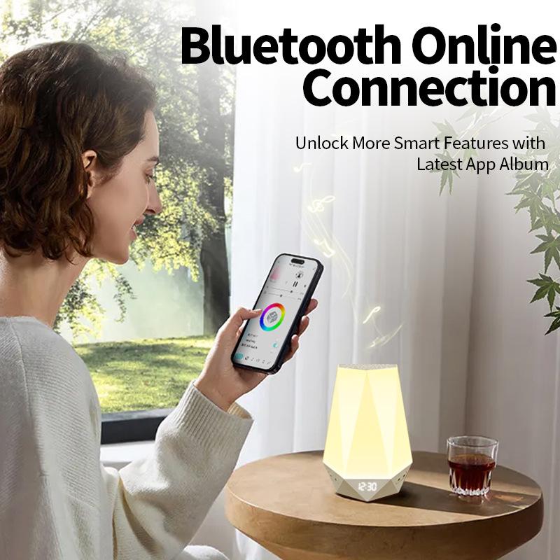 Digital display white noise sleep aid with wireless remote control and app functionality Featuring a diamond-inspired design