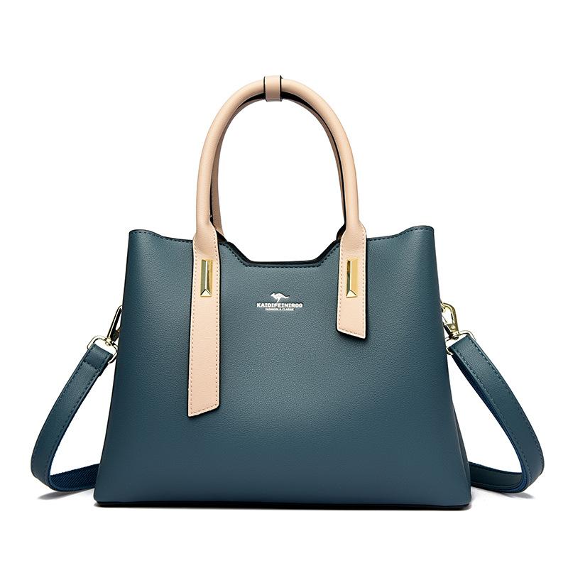 This Fashionable Color-blocking Bag Is Simple Elegant and Stylish for Ladies. It's A Hand-held Shoulder Bag