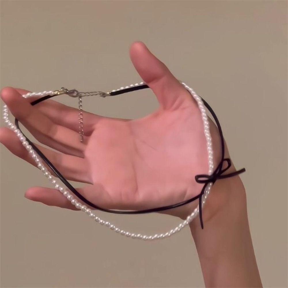 

Регулируемое жемчужное ожерелье Темпераментная цепочка на ключицу 2024 Ленточный чокер чёрный