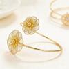 Elegant European-American Floral Metal Armband: Adjustable Fashion Bracelet