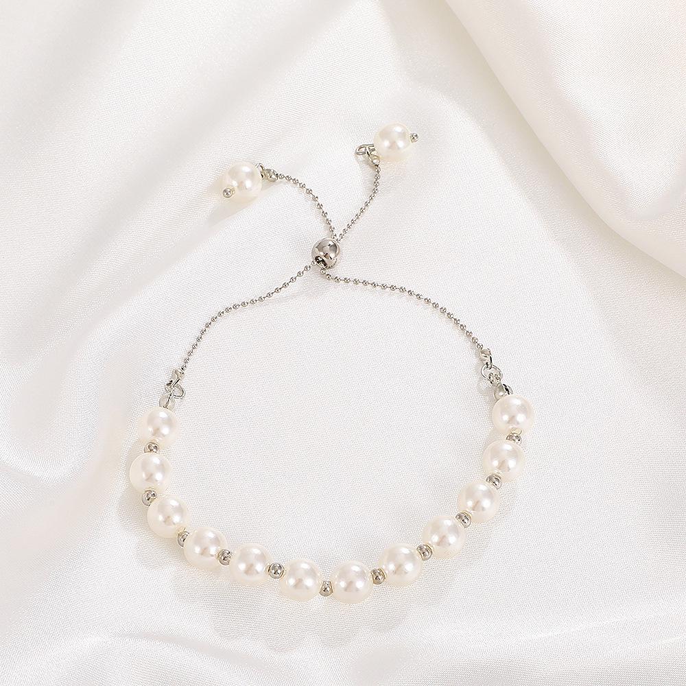 

Европейский и американский браслет с кисточками из бисера и жемчуга: Элегантный французский стиль, легкая роскошь, нишевый дизайн, регулируемый для женщин K X826 белый