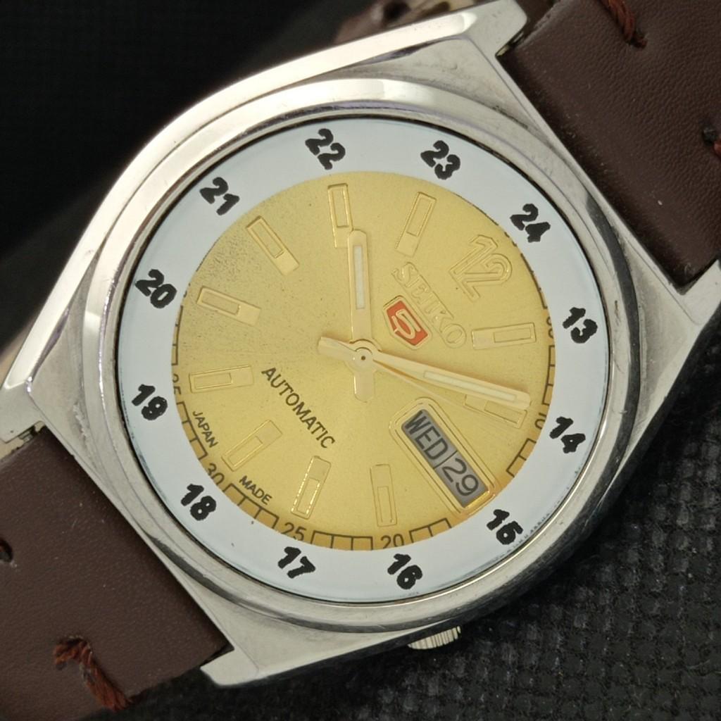 

USED VINTAGE SEIKO 5 AUTO 7009A JAPAN MENS DAY/DATE GOLDEN WATCH 595a-a312344-9 SKU595a-a312344