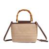 Nischen Design Retro Handgehaltene Strohtasche für Damen Neue Modische Vielseitige Schulter Crossbody Tasche Gewebte Eimer Tasche