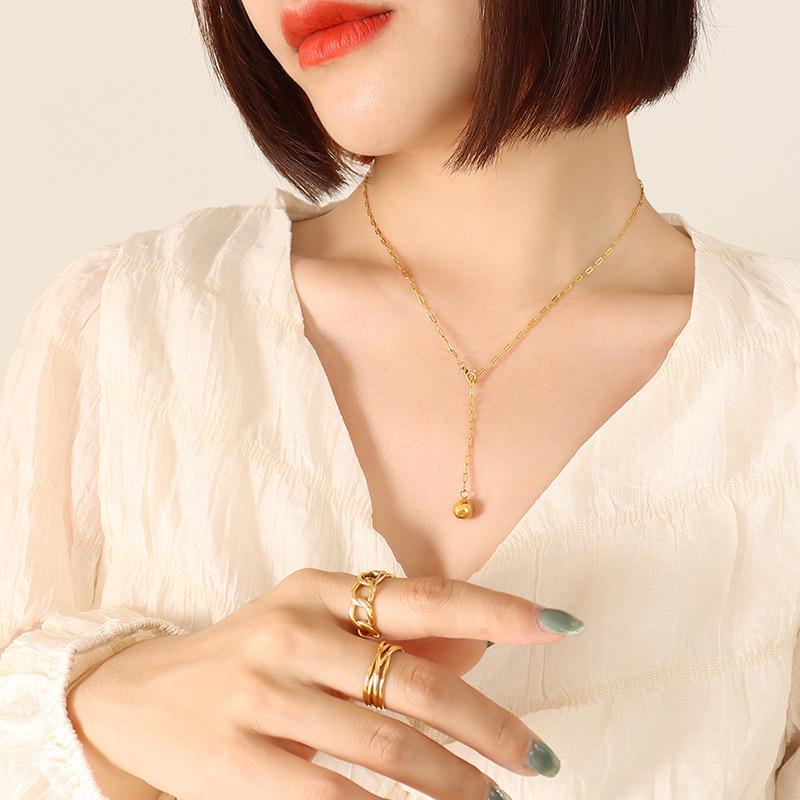 Gold-Plated Geometric Polygon Sphere Pendant Necklace with Adjustable Tassel – Versatile Titanium Steel Clavicle Chain