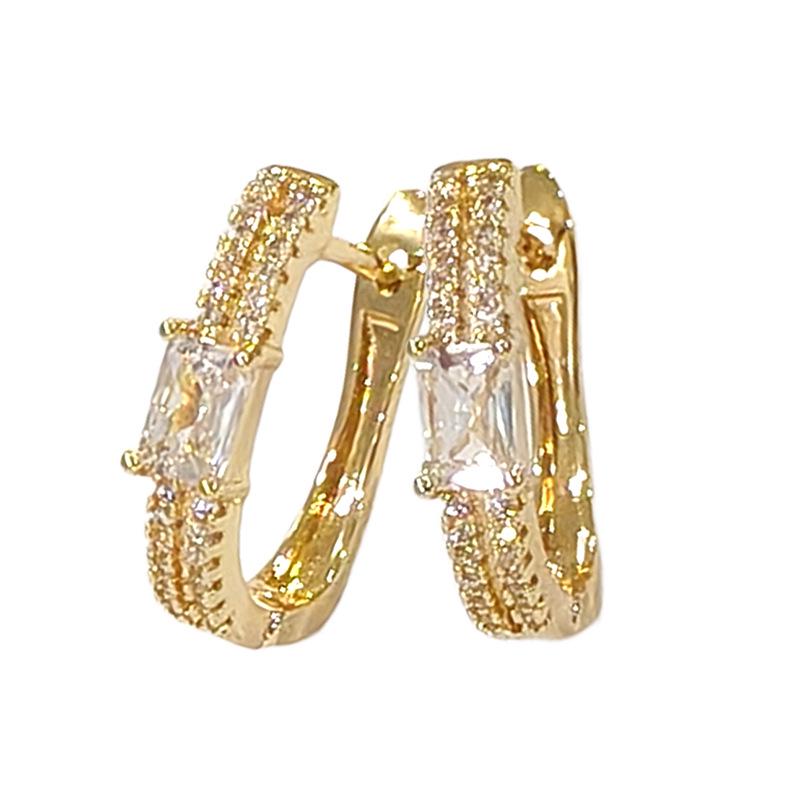 Elegant U-Shaped Copper Zirconia Earrings: Unique, Luxurious, and Beautifully Detailed Accessory. Copper Zirconia Earrings золотой