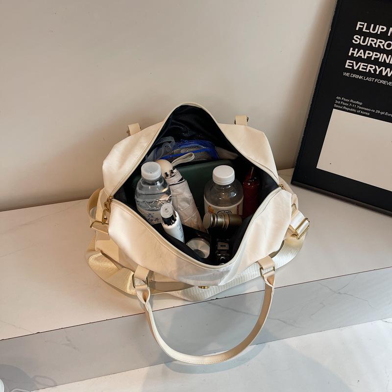 Large capacity portable short travel bag luggage bag women's fashion light handbag swimming business trip fitness storage bag