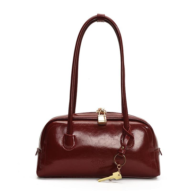 Simple retro bag women's new fashion niche shoulder armpit bag high-end commuter baguette bag