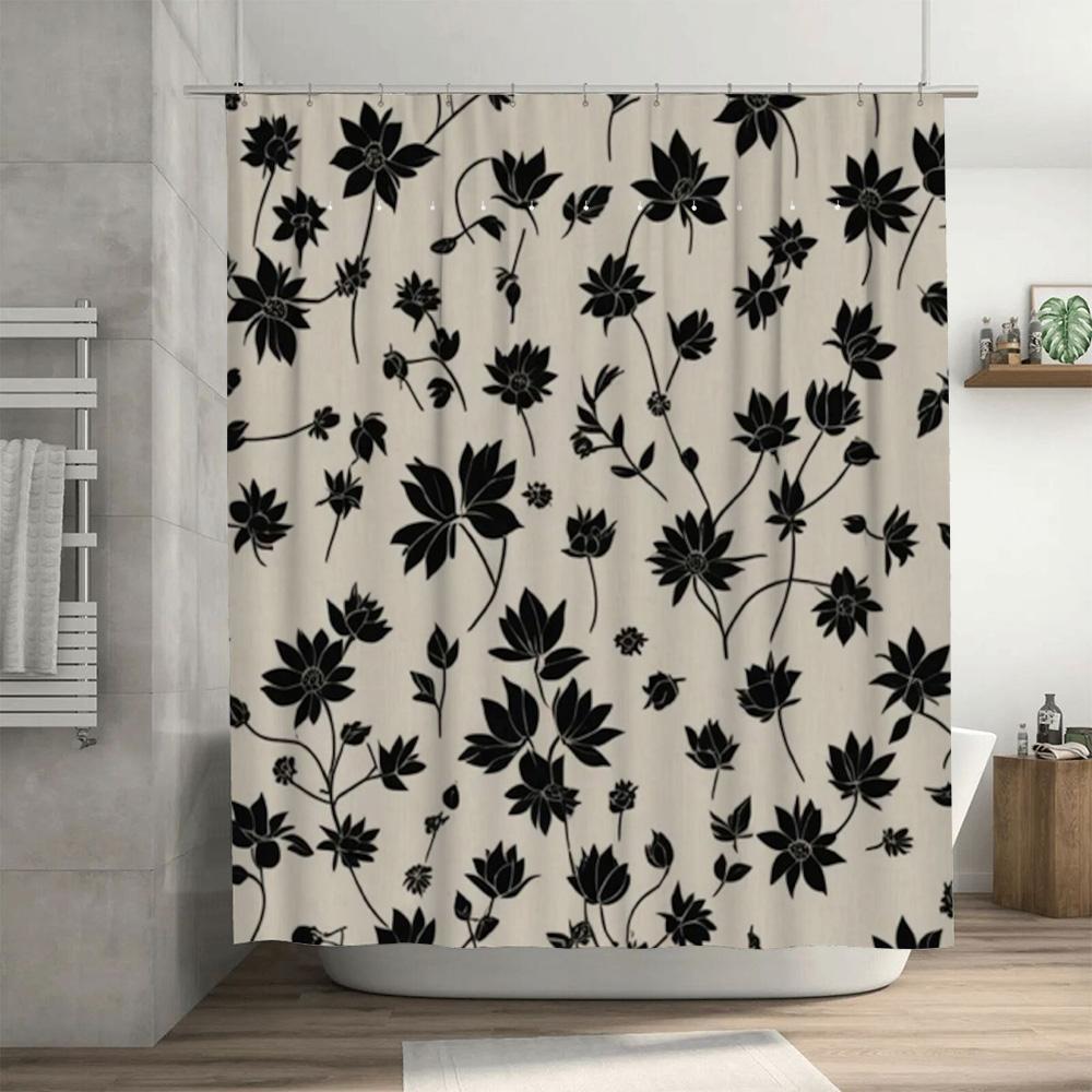 Decorate your bathroom with this elegant black floral shower curtain featuring a modern design and durable fabric for long-lasti