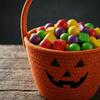Halloween Candy Storage Basket Handheld Woven Bag with Pumpkin Face Print for Snack Treat Collection and Organization