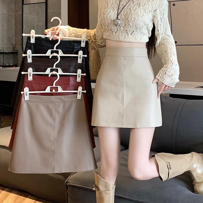 Women's Black High-Waisted PU Leather A-Line Mini Skirt - Slimming and Anti-Exposure, Perfect for Spring and Autumn.