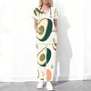 Women Plus Size Printed Scrub Set Crisscross Cutout Neck Short Sleeve Pockets Top Long Pants