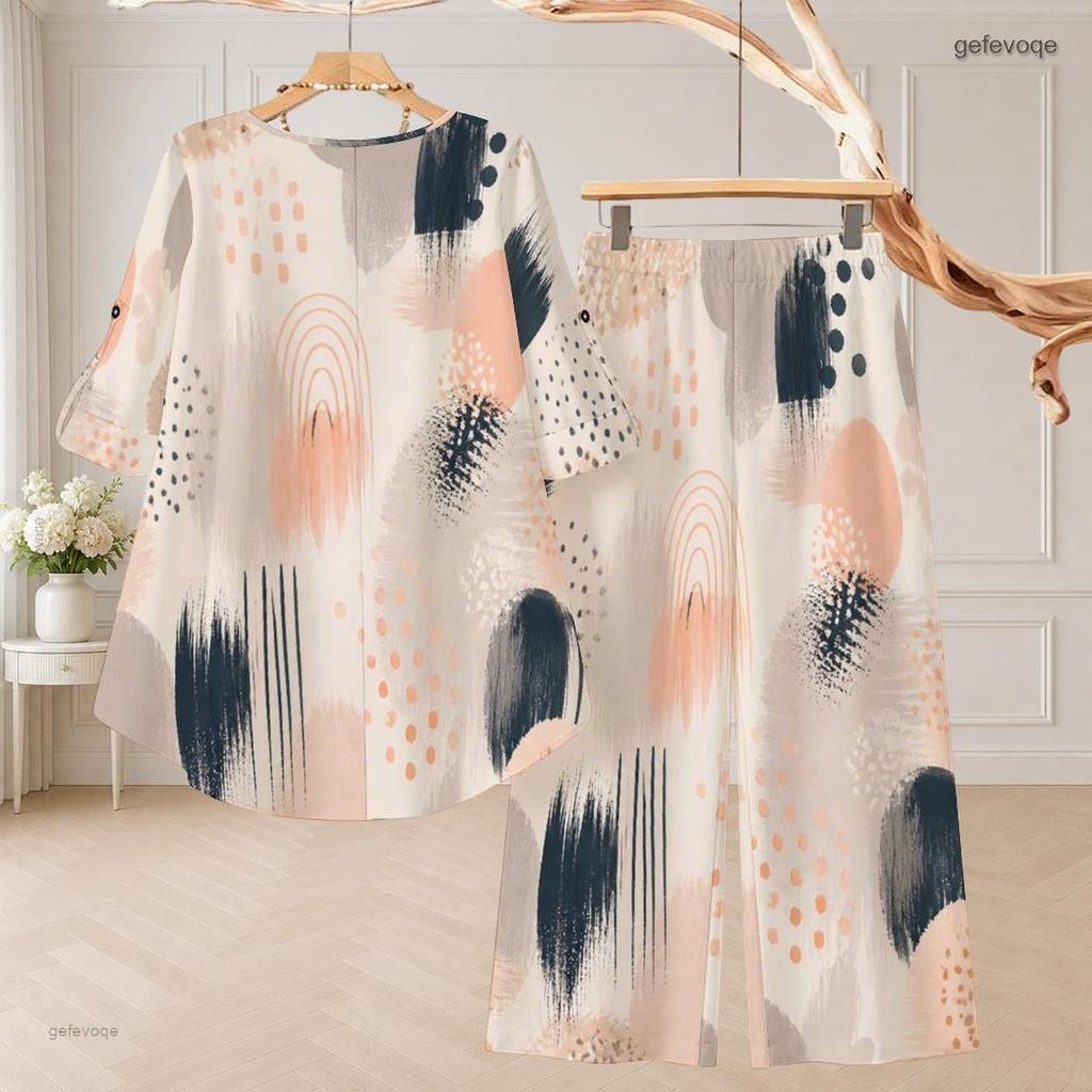 Women Plus Size White Printed Two Piece Set Round Neck Half Sleeve High Low Top Wide Leg Pants
