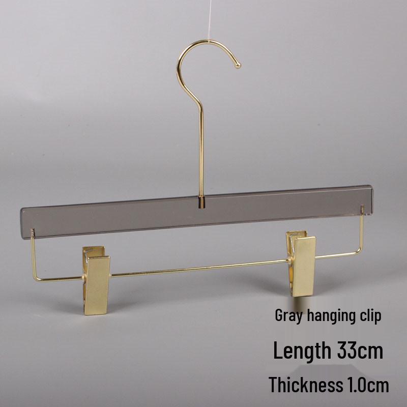 Špičkové kouřově šedé průhledné protiskluzové ramínko se zlatým plochým háčkem a klipem na kalhoty pro dámské a pánské oblečení