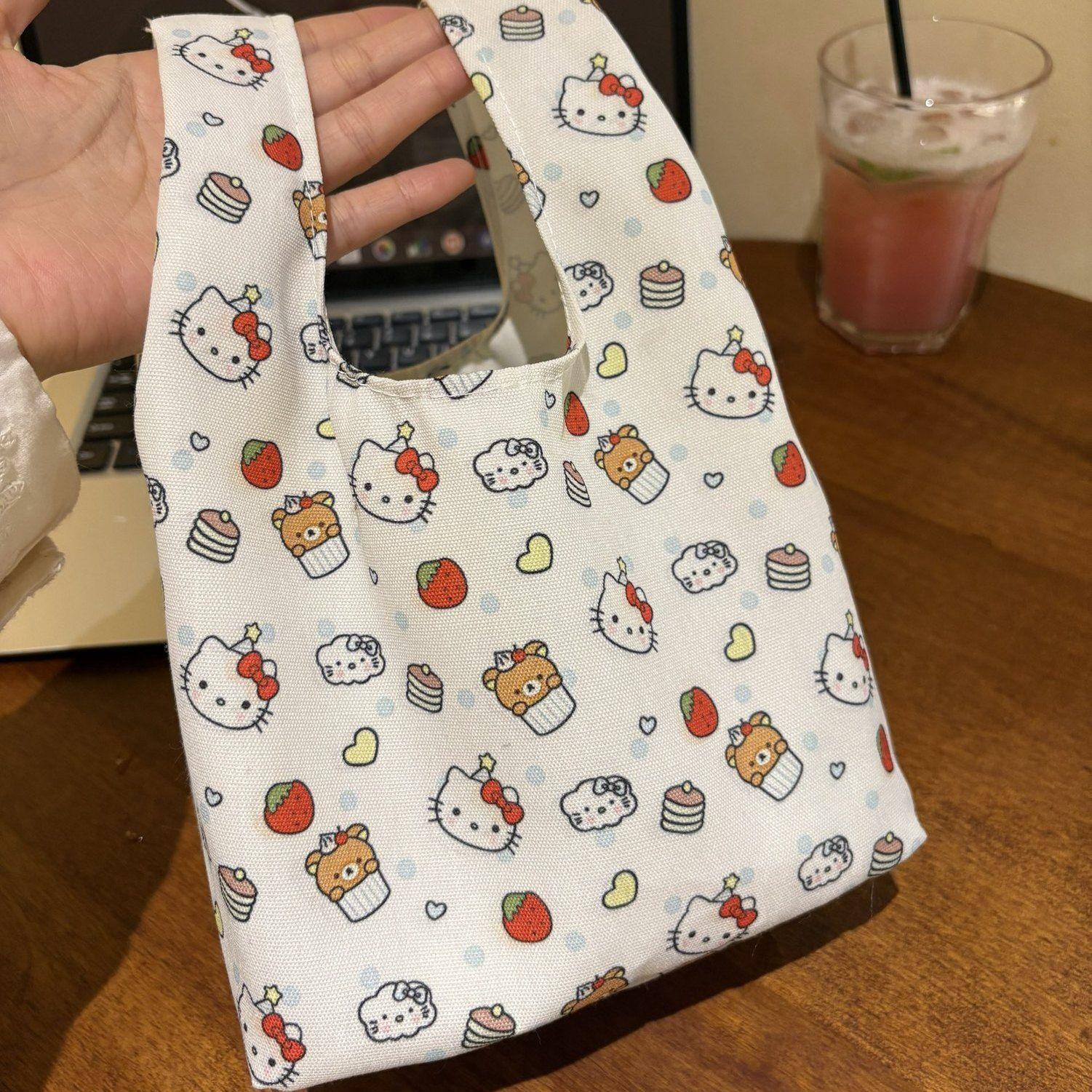 

Cute New Kitty Handbag Canvas Cartoon Lunchbox Portable Wristbands Bag Mini Fresh Women s shoulder bag Sweet Women s Tote Bag