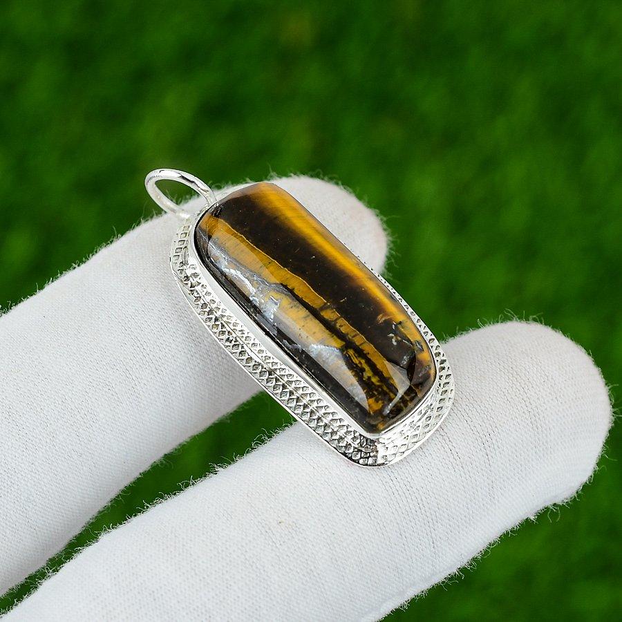 

Sterling Silver Tiger Eye Stone Sacral Chakra Artisan Daughter New Boho Pendant