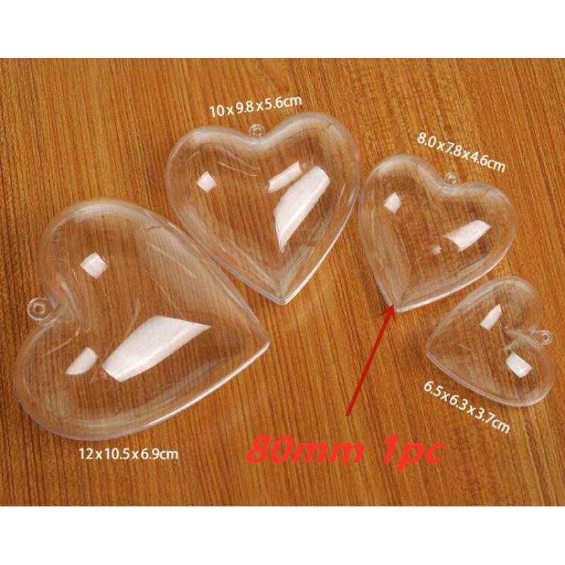 Transparente, hohle Plastikkugel, die als Weihnachtsdekoration für Süßigkeitenschachteln und zum Aufhängen ewiger Blumen verwendet wird.