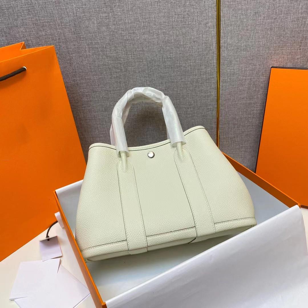 

Новая садовая сумка из натуральной кожи TOGO Lychee Pattern, модная сумка-тоут, ручная женская сумка, классическая, большой емкости 25x11x15cm белый