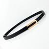 Versatile Black Cowhide Thin Leather Belt for Women: Simple Korean Style Decorative Waist Accessory for Dresses and Suits.