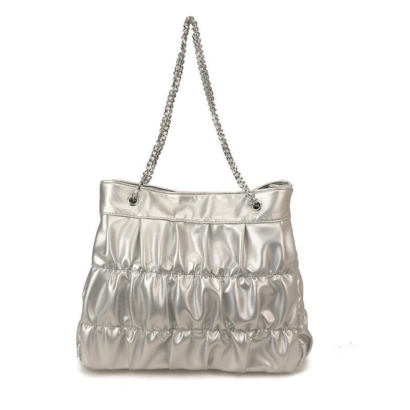 

Large capacity pleated niche tote bag women s 2026 spring new delicate chain shoulder armpit bag 31*10*27 срібний