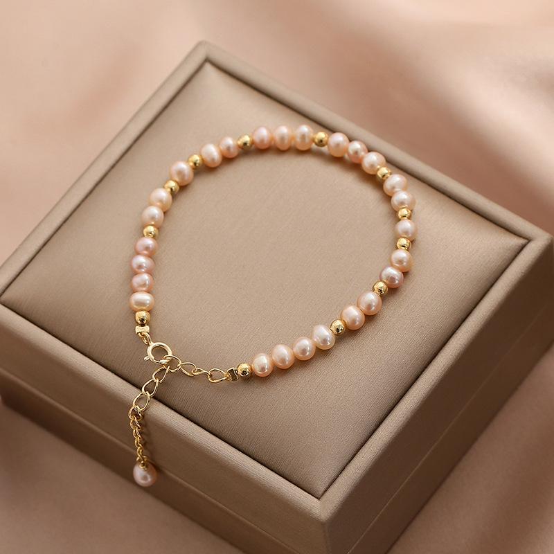 

Minimalist style bracelet for women with natural freshwater pink pearls and small beads14k Unique designer bracelets for gifts
