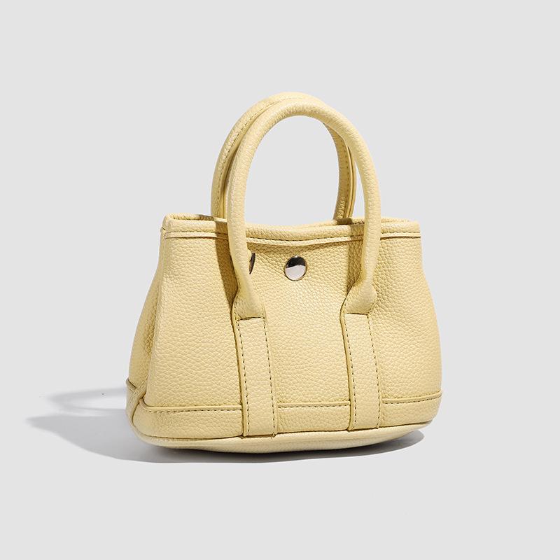 Casual Simple Small Bag Women's New Spring Niche Design Fashion Trend Shoulder Messenger Bag Bucket Bag