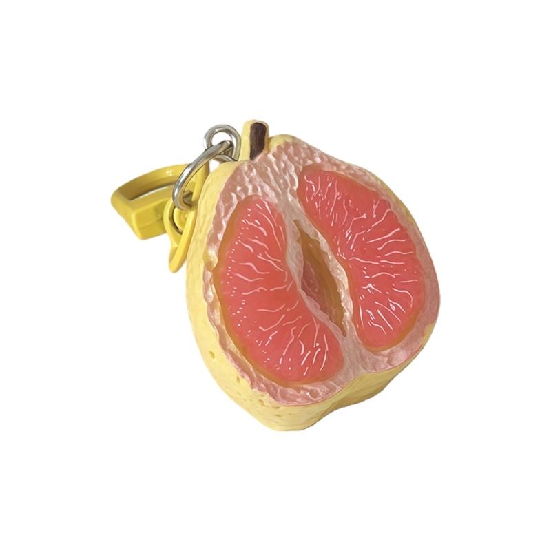 

Realistic Peeled Pomelo Keychain Miniature Food Toy for Keys Bags Wallets Elegant Gift for Fruit Lovers червоний