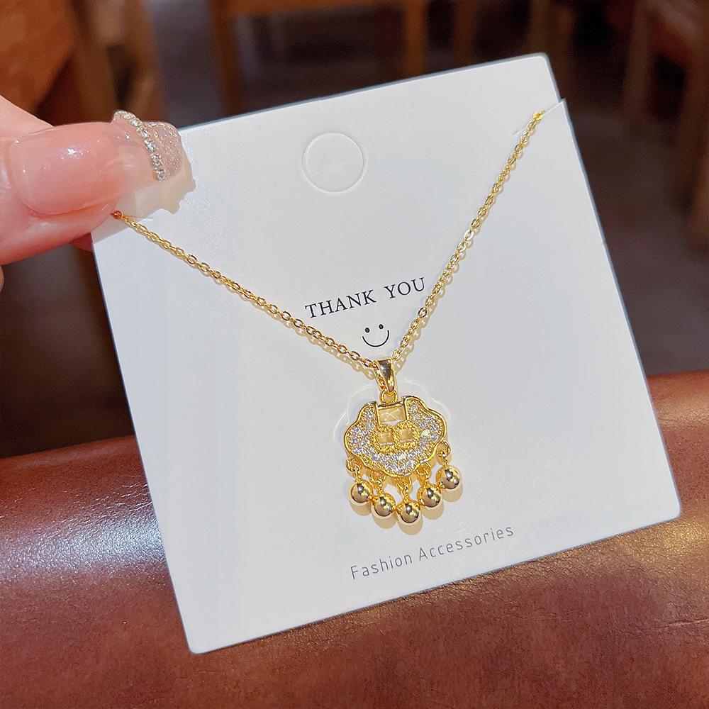 Design en følelse av sikkerhetslås studentanheng 18K gull mote kragebenskjede for å sende barn lykkebringende gaver lang levetid lås halskjede.